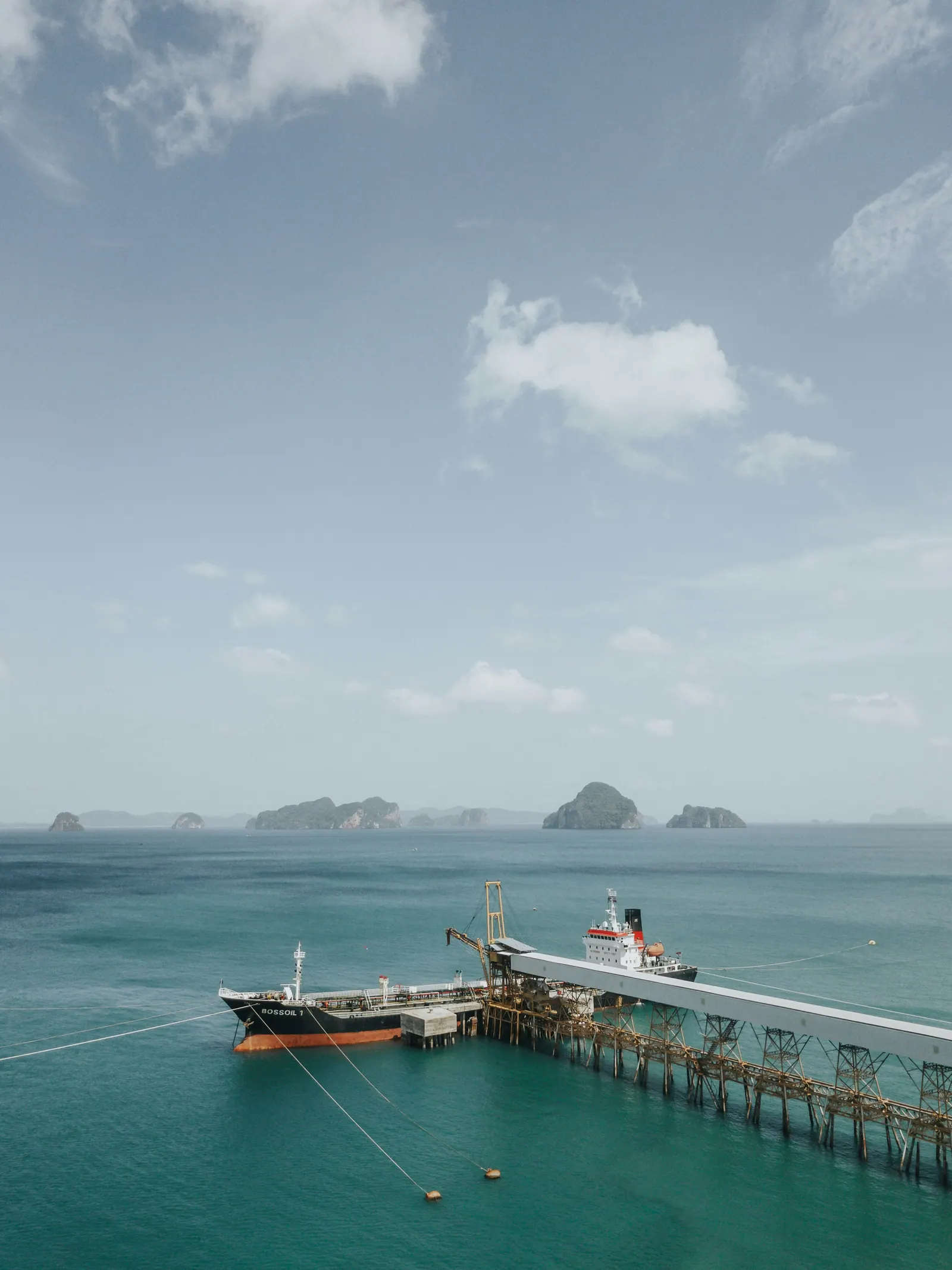 Pier and boat on calm water